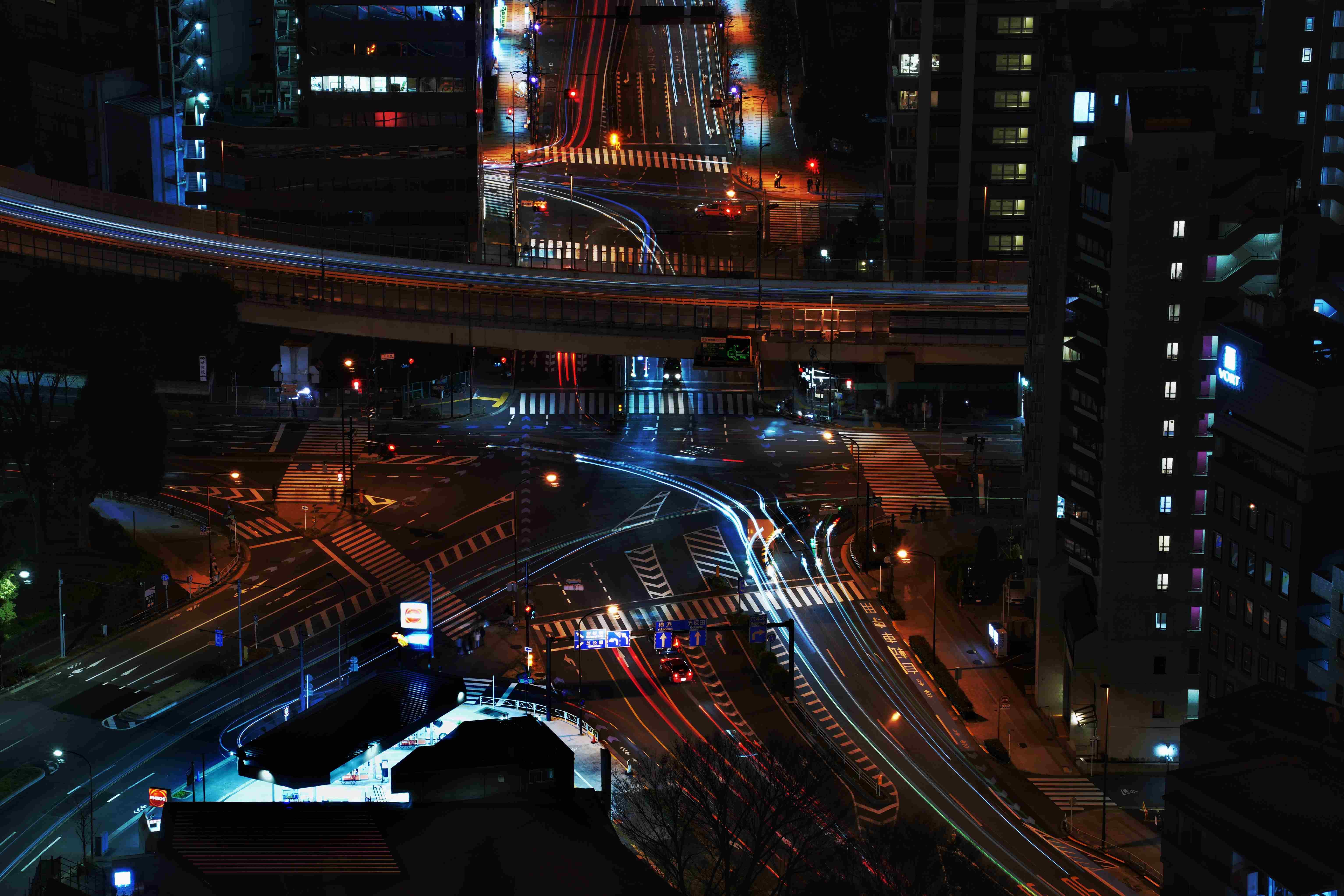 Urban Pulse : The Fusion of Light Trails and Skyscrapers