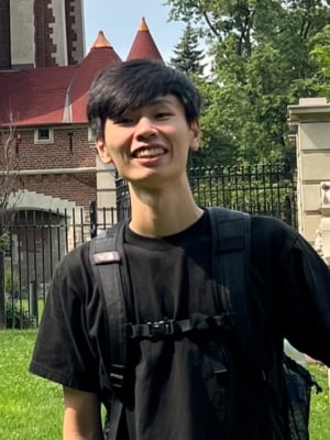 A portrait of Tsang Tsz Yeung wearing a black tshirt