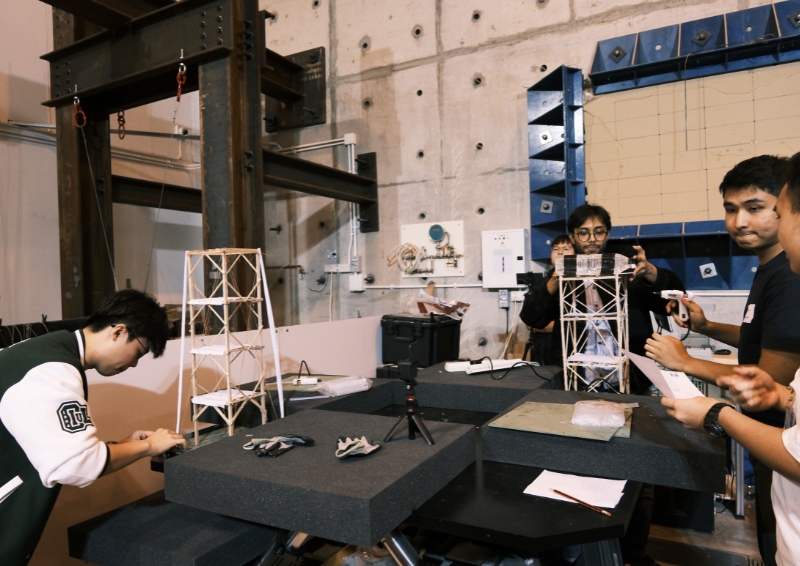 Teams fixing loads (weights) to their models. Image credit: ICE HKA G&amp;S