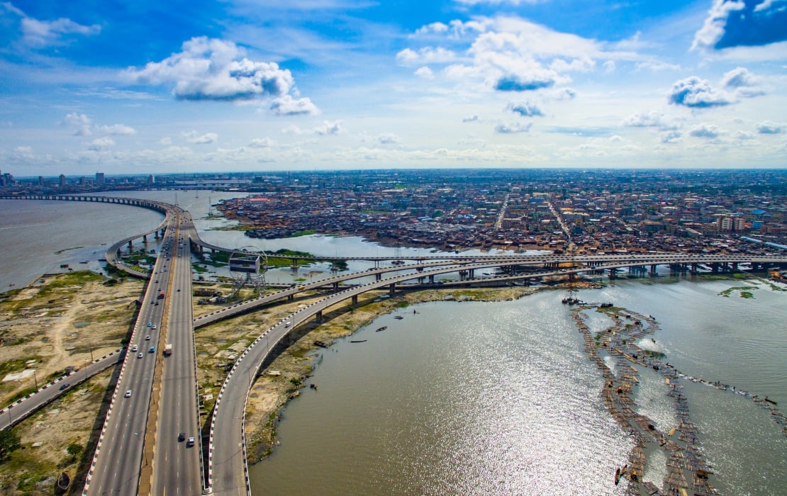 aerial view of bridge with city